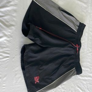 BK athletic interval LLC shorts. 100% polyester. Zippered side pocket no liner
